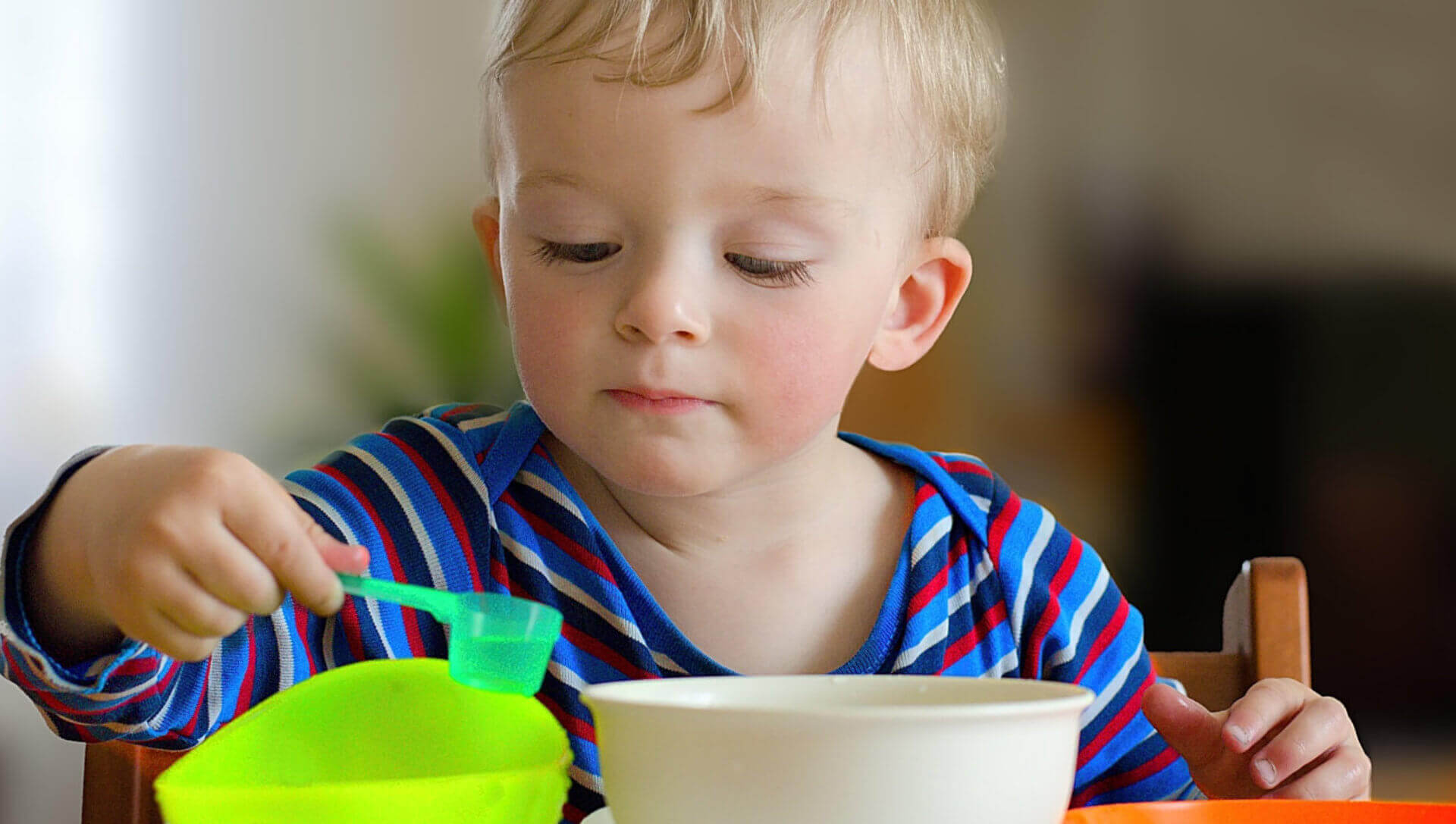 Toddler playing with water