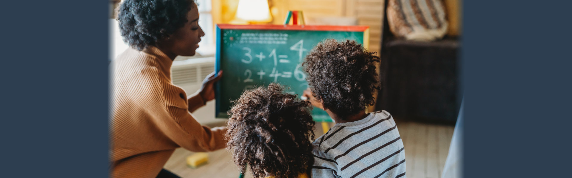 children learning maths with teacher