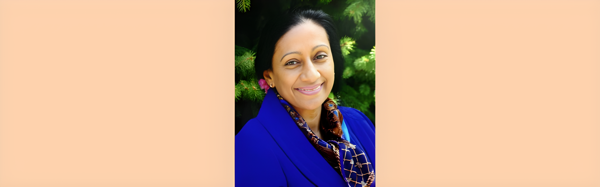 Smiling woman in blue jacket